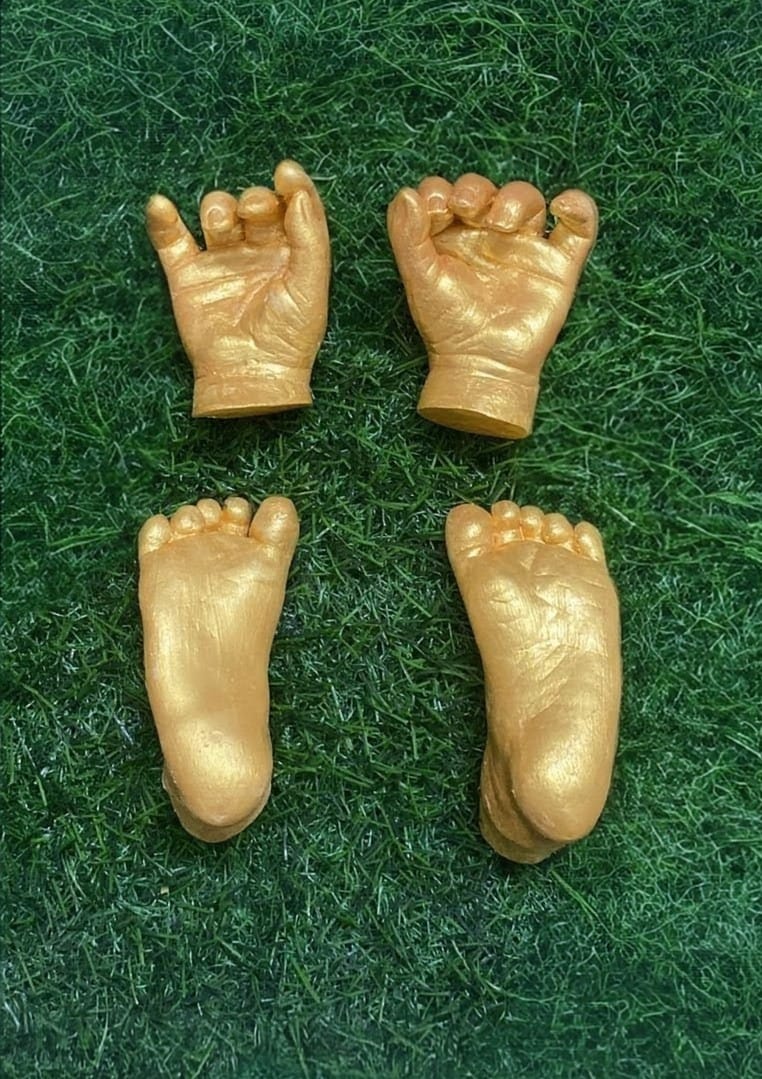 Newborn baby hand and foot casting